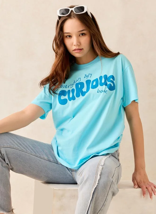 أوجيدر تيشيرت أزرق بطبعة جرافيك وياقة دائرية