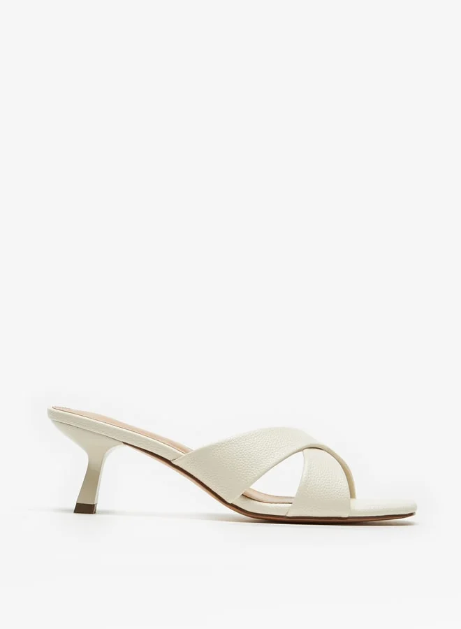 فلورا بيلا من شو إكسبرس Cross Strap Slip-On Sandals with Flared Heels