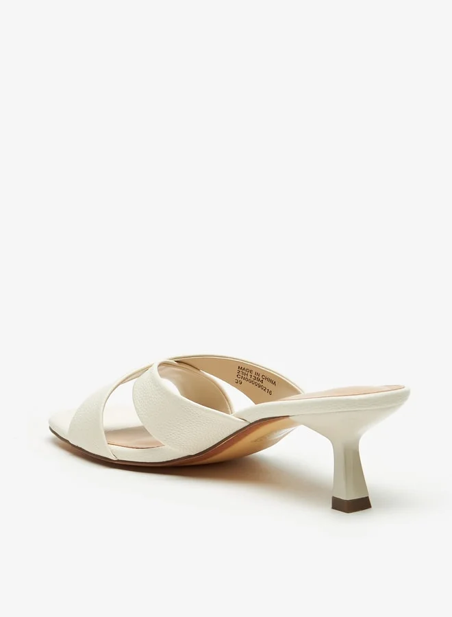 فلورا بيلا من شو إكسبرس Cross Strap Slip-On Sandals with Flared Heels
