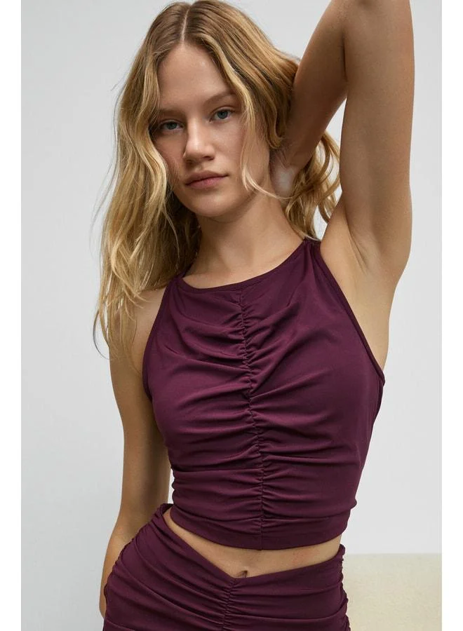 Urban Beat  MOVEXA Women’s Stretchy and Soft-Textured Round-Neck Front-Ruched Halter-Back Burgundy Bustier for Women | Best Price UAE