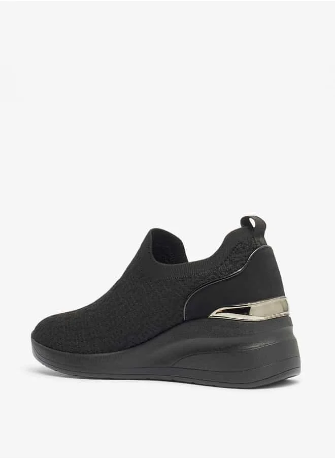 فلورا بيلا من شو إكسبرس Women All-Over Monogram Textured Slip-On Low Ankle Sneakers