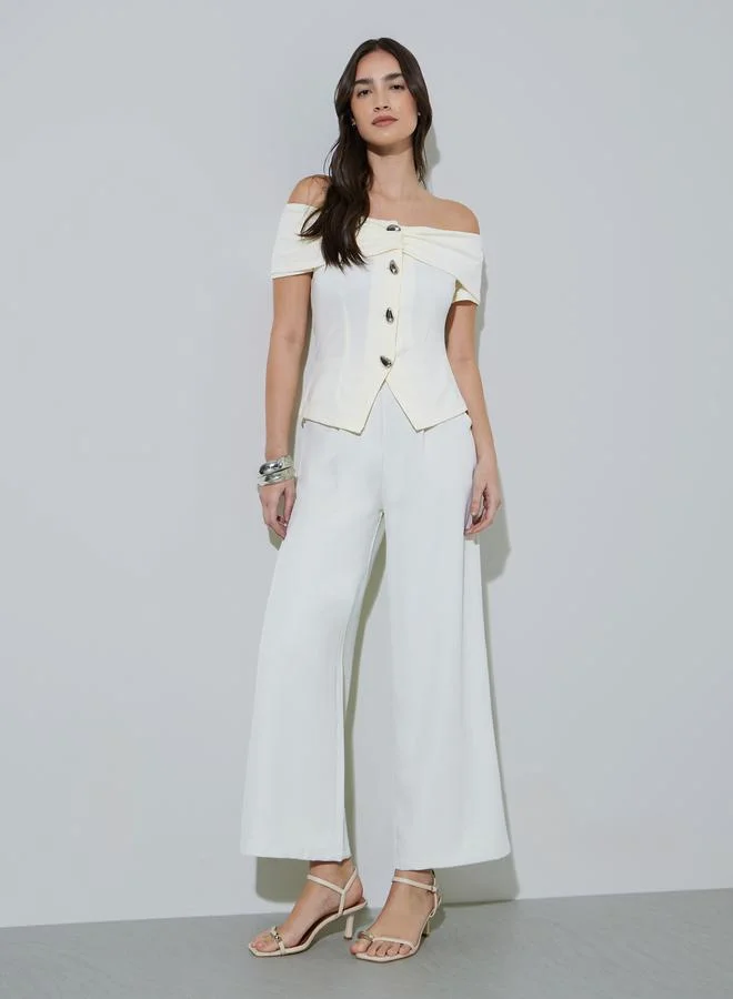 ستايلي Beige Solid Metal Buttons Embellished Knit Top