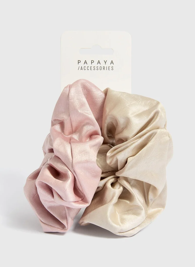 ماتلان عبوتان كبيرتان من ربطات الشعر الملونة