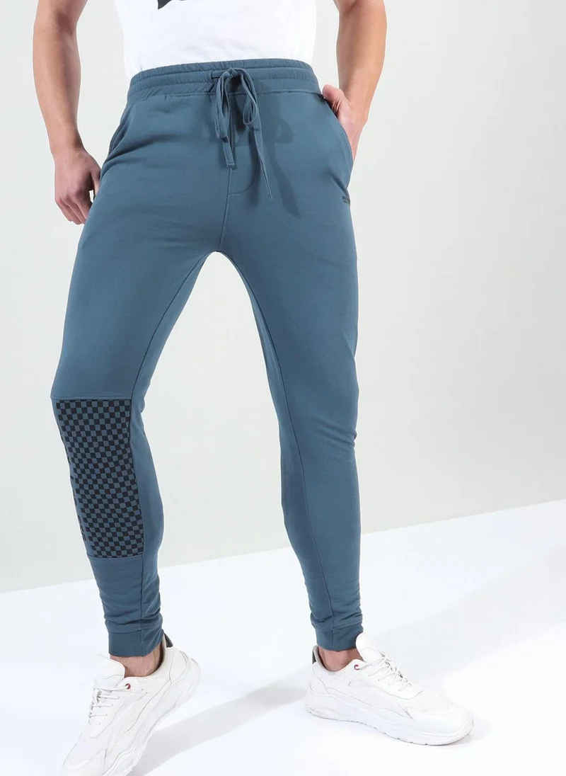 The Indian Garage Co Men Slim Fit Solid Mid-Rise Stretchable Knitted Jogger Trousers