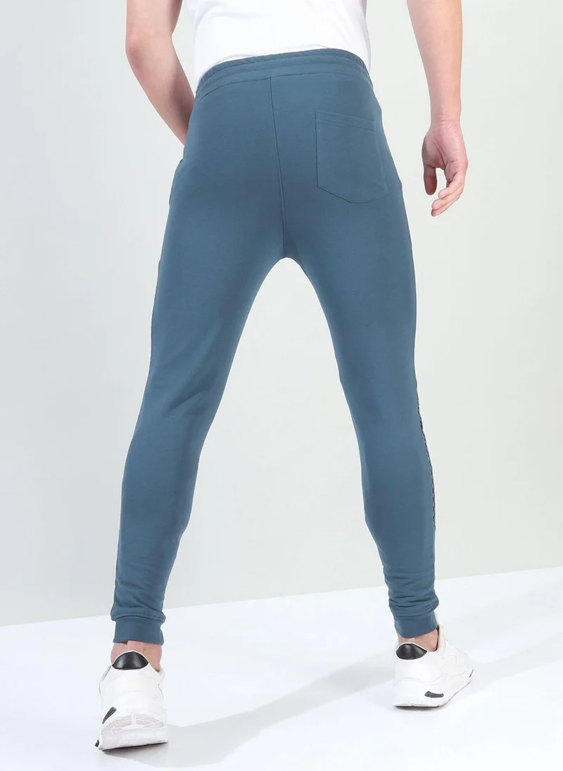 The Indian Garage Co Men Slim Fit Solid Mid-Rise Stretchable Knitted Jogger Trousers