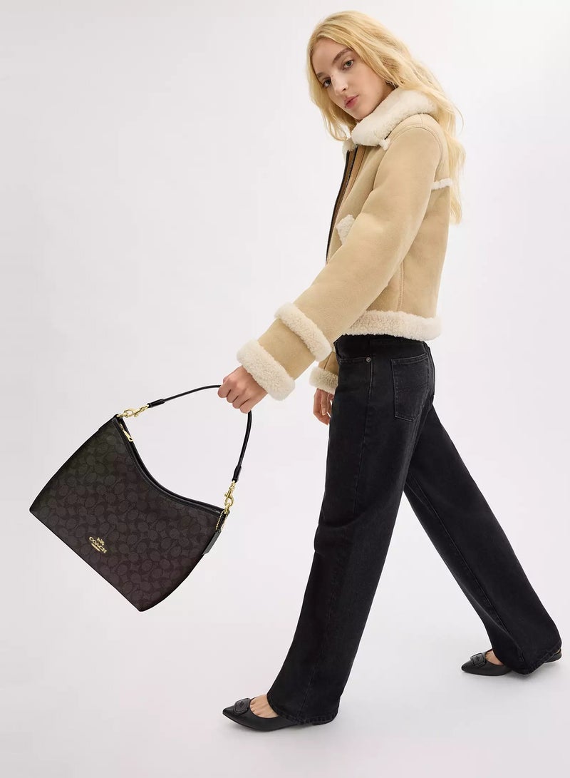 كوتش اوت ليت حقيبة كتف كوتش لوريل من قماش سيجنيتشر، حقيبة كروس بودي نسائية، حقيبة يد نسائية، حقيبة كتف نسائية، حقيبة سفر نسائية، لون الجوز الأسود - 31 سم - Image 2