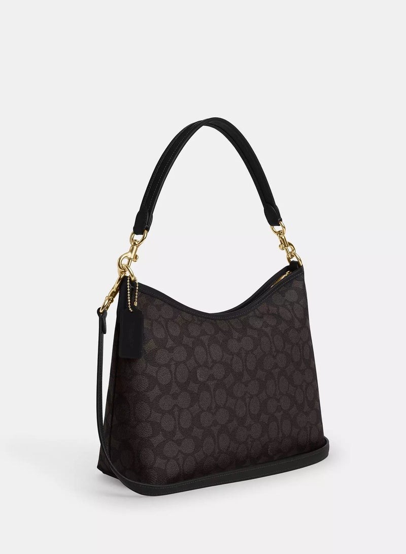 كوتش اوت ليت حقيبة كتف كوتش لوريل من قماش سيجنيتشر، حقيبة كروس بودي نسائية، حقيبة يد نسائية، حقيبة كتف نسائية، حقيبة سفر نسائية، لون الجوز الأسود - 31 سم - Image 4