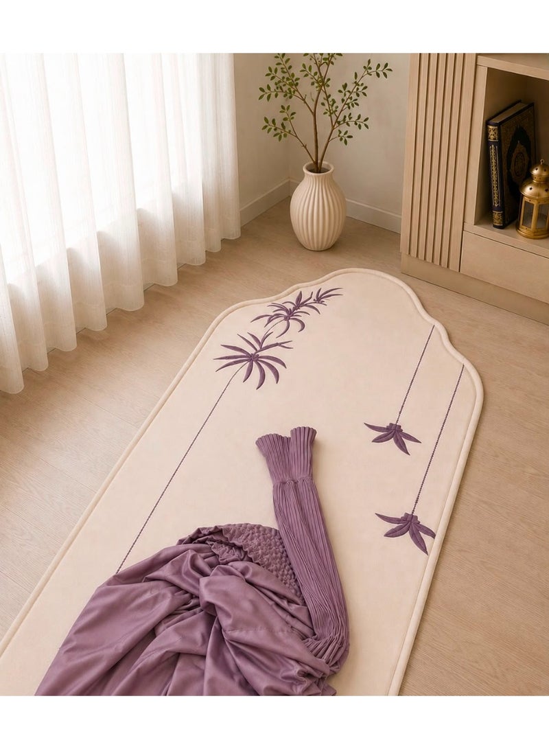 The Palm Prayer Set is a distinctive set consisting of a prayer rug with a foam lining in the shape of a mihrab, and a plain prayer garment with pleats and an attached headscarf. One large size for women.