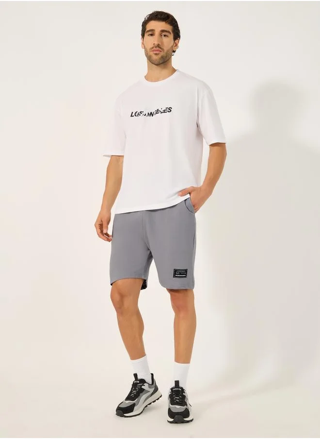 ستايلي Styli Badge Detail Regular Fit Terry Shorts