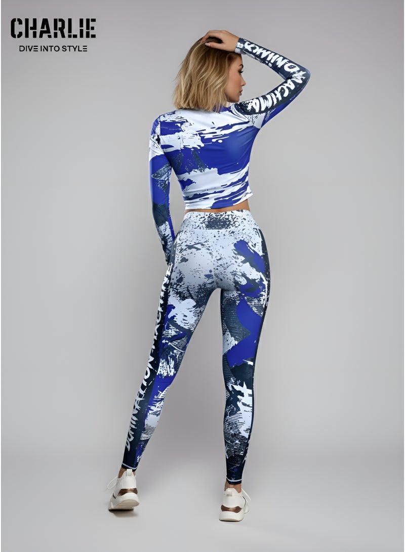 شارلي طقم رياضي نسائي حصري مكون من قطعتين - جاكيت رياضي مطبوع باللونين الأزرق والأبيض وبنطال ضيق بخصر عالٍ - ملابس رياضية، ملابس رياضية، ملابس يوغا وملابس رياضية - مقاس متوسط - الكمية محدودة - Image 3
