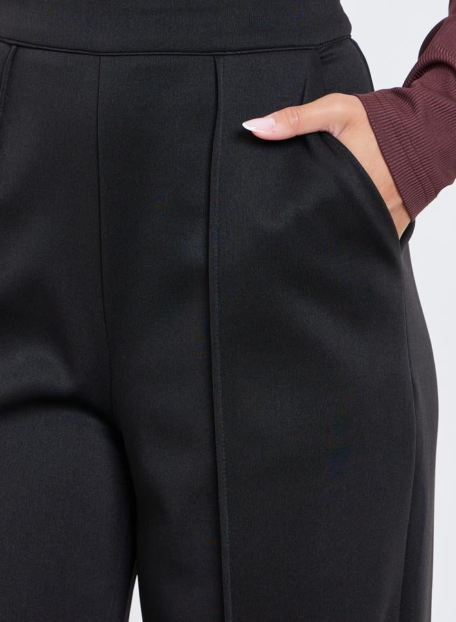 ستايلي بنطال سادة بأرجل واسعة وخصر مطاطي - Image 3