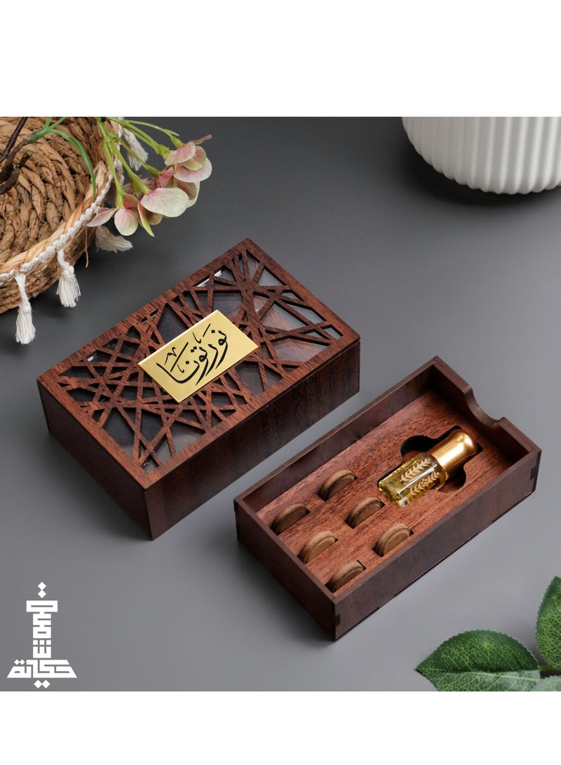 Story Of Candle A box of natural Moroccan oud tablets with a quarter of a tola of oud oil engraved with an Arabic phrase 