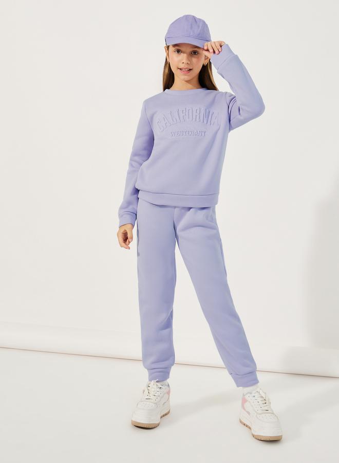 Styli Embossed Slogan Print Round Neck Sweatshirt & Joggers Set - Image 1