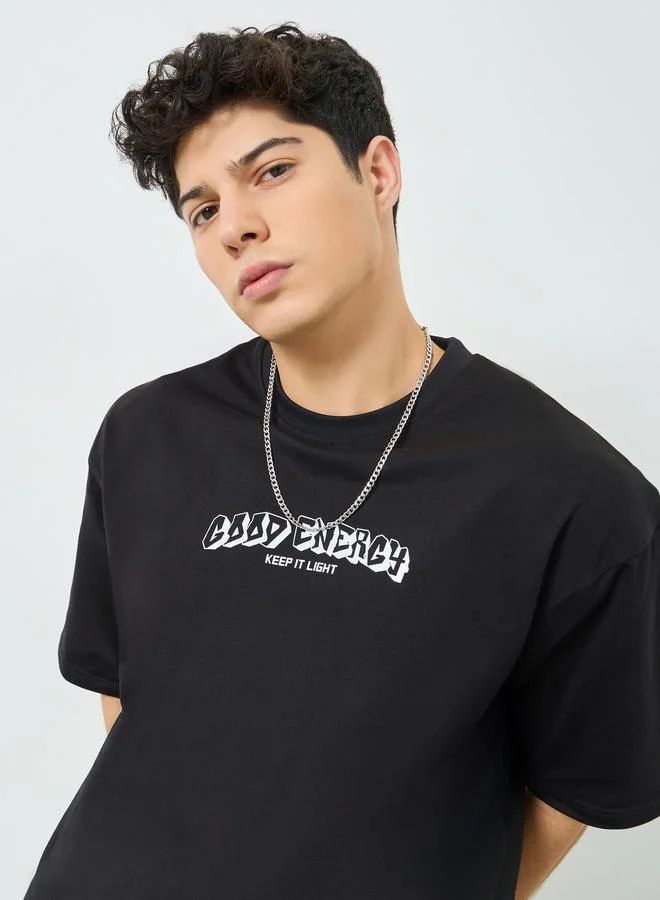 Styli Men Black Graphic Print Oversized T-Shirt