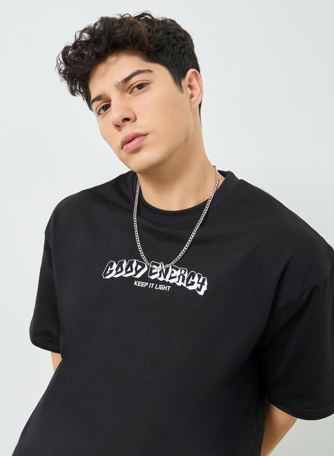 Styli Men Black Graphic Print Oversized T-Shirt - Image 1