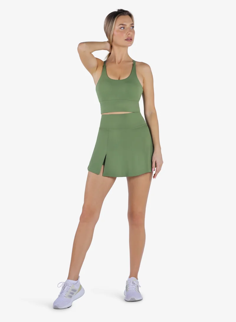 Yeseco  Activewear Set – Green Padded Criss-Cross Sports Bra & High-Waist Flared Skirt with Built-In Shorts for Women | Best Price UAE