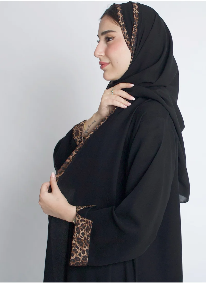 HAWRAA ABAYA Black wrap abaya with tiger fabric overlay on both sides of the abaya and double sleeves