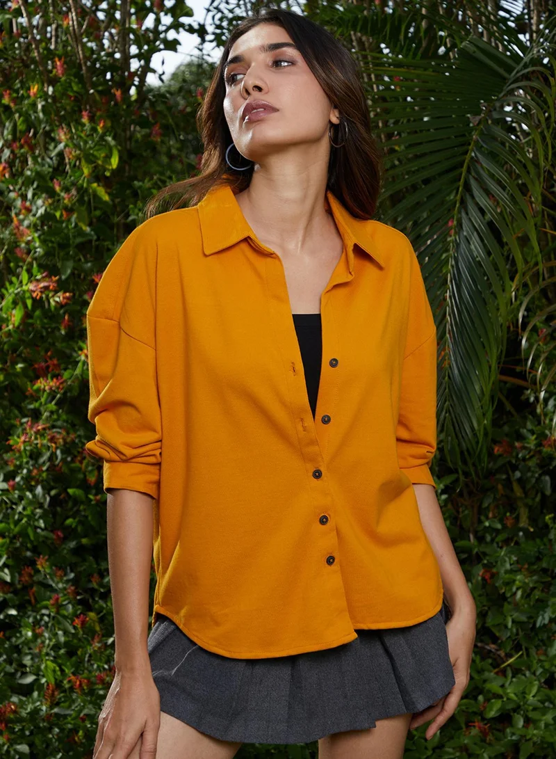 كامبوس سوترا قميص نسائي أصفر كهرماني سادة بقصة واسعة للملابس الكاجوال بياقة ممتدة وأكمام طويلة بأزرار