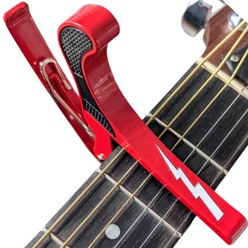 Powered By Rock Guitar Capo for Acoustic and Electric Guitars - Guitar Accessory to Instantly Change Key & Chord - Quick Release, Spring Action Grabber - White Lightning Design - Image 1