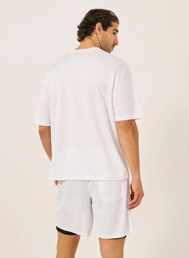 Styli Active  Minimal Printed Mesh T-Shirt and 2in1 Shorts Set for Men | Best Price UAE