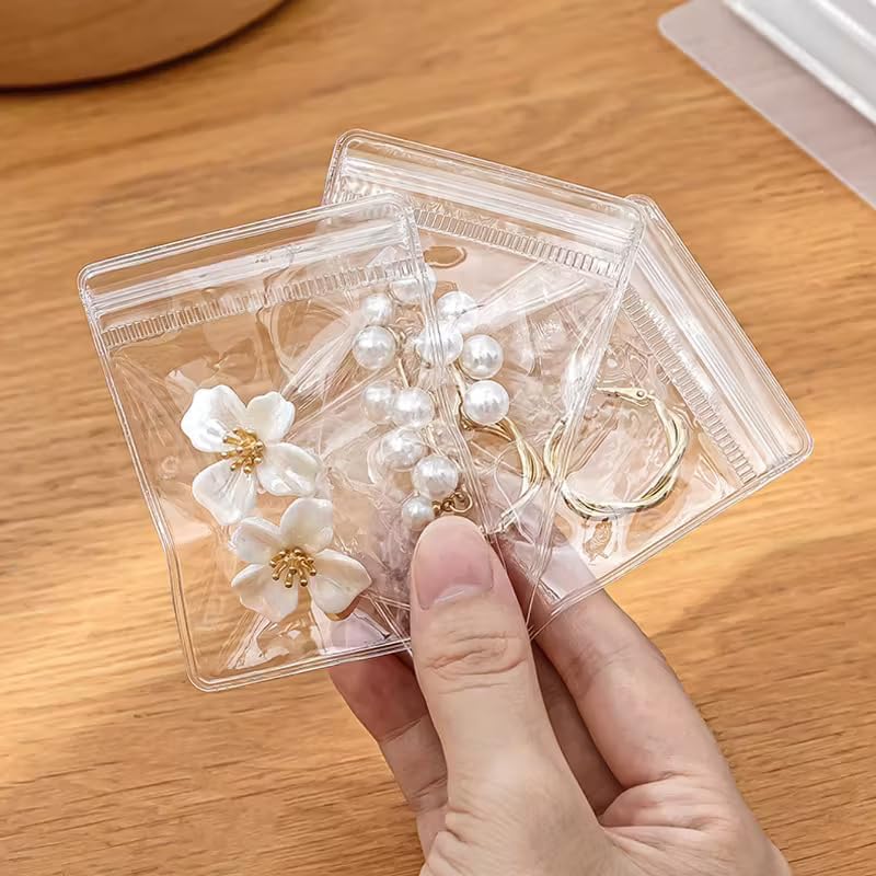 Nibbler 50 Pcs small Jewellery Organiser Storage Pouches Clear Zip Lock Cover for Rings, Earrings, Transparent, Polyvinyl Chloride PVC (Small) - Image 4