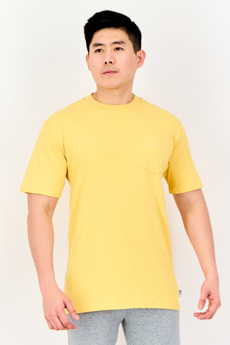 Puma x Select Men Sportswear Fit Short Sleeves Outdoor T-Shirt, Mustard Yellow - Image 1