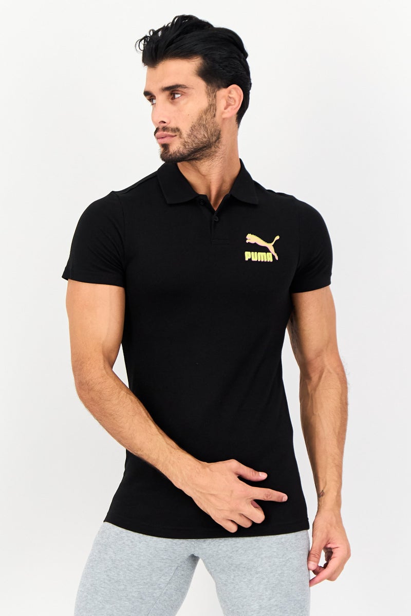 PUMA قميص بولو خارجي للرجال بقصة ضيقة بأكمام قصيرة، أسود - Image 1