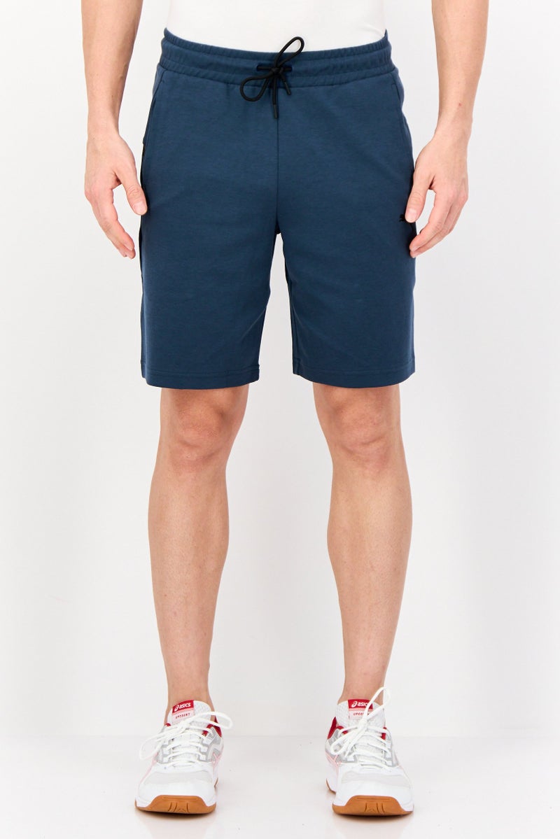 PUMA Men Sportswear Fit Outdoor Shorts, Teal Blue  - Image 1