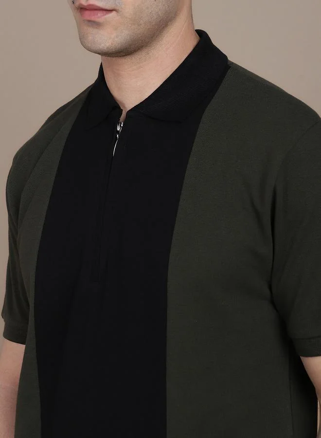 دينيس لينغو بولو بقصة ضيقة بألوان متداخلة مع سحاب