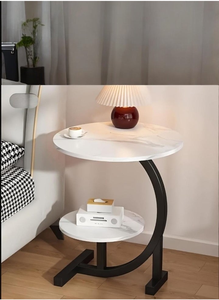 Black two-tier service table with marble-like wood. The diameter of the large table is 35 cm, the small one is 25, and the total height of the table is 50 cm.