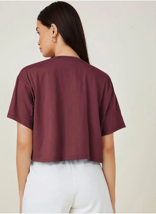 كوتي Solid Short Sleeve Oversized Crop T-Shirt by Styli