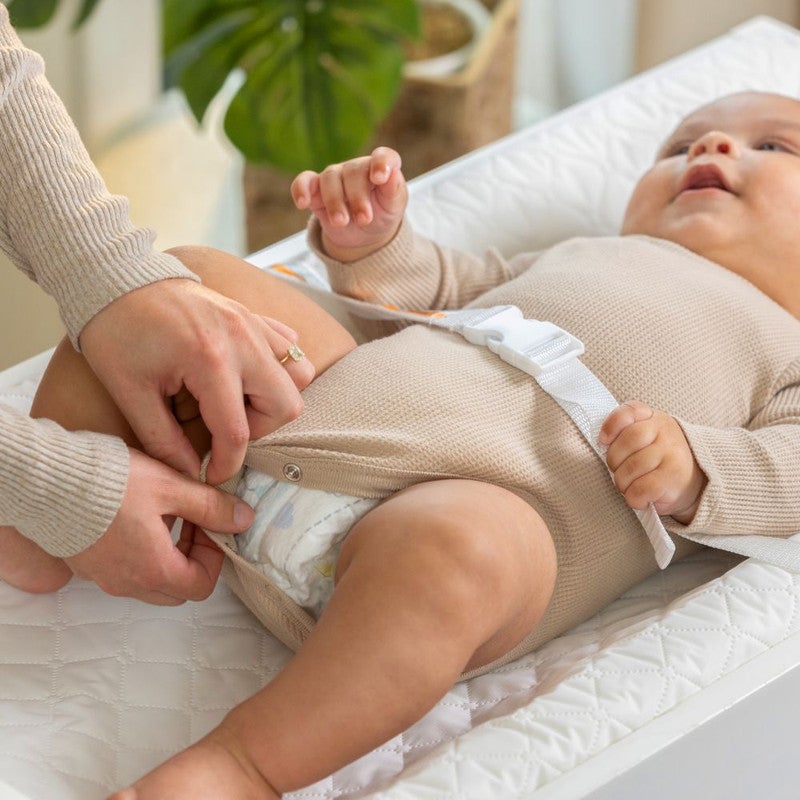 ingenuity Summer by Ingenuity - Contoured Changing Pad, Waterproof Design with Safety Strap, Ages 0–24 Months - Image 3