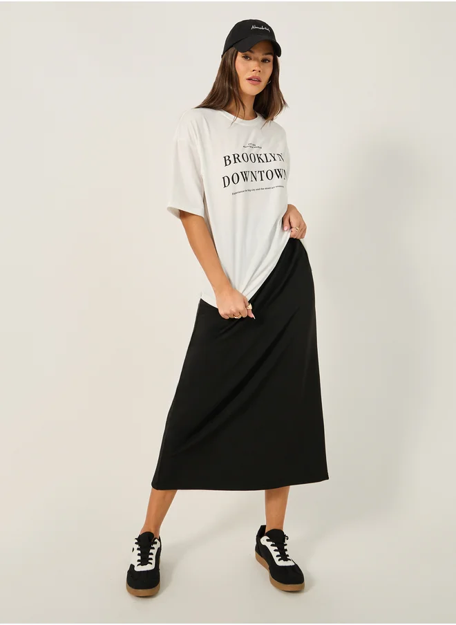 Styli Oversized Slogan Print T-Shirt and Midi Skirt Co-Ords