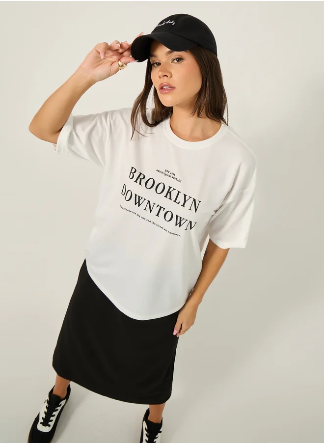 Styli Oversized Slogan Print T-Shirt and Midi Skirt Co-Ords