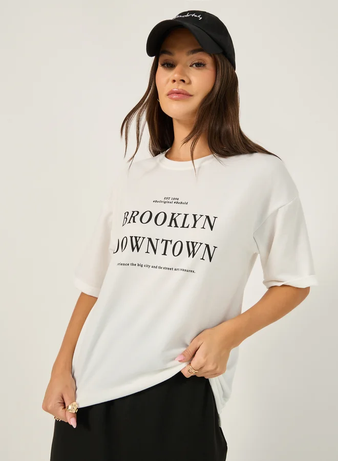 Styli Oversized Slogan Print T-Shirt and Midi Skirt Co-Ords
