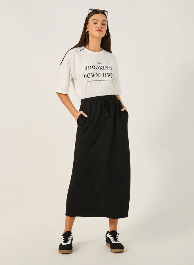 Styli Oversized Slogan Print T-Shirt and Midi Skirt Co-Ords
