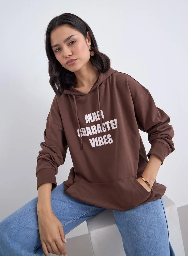 Styli Brown Oversized Slogan Print Hoodie