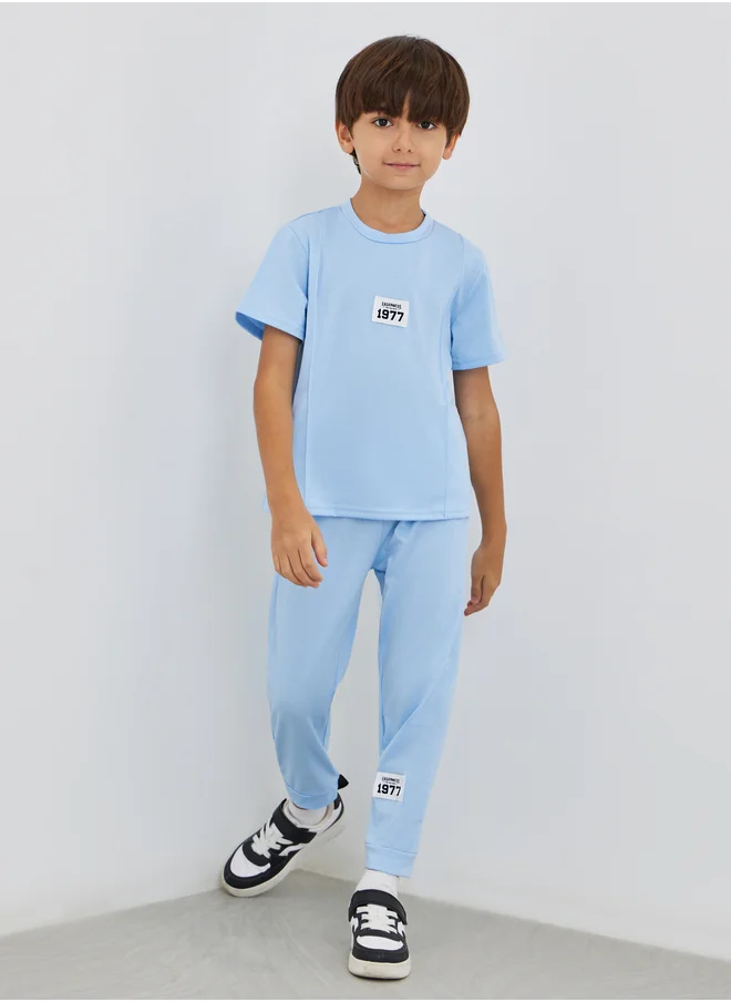 ستايلي Styli Boys Blue Solid Badge Detail T-Shirt and Joggers Set