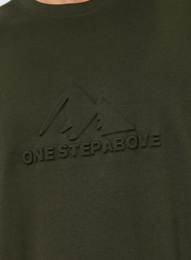 Styli Men Olive Graphic Embossed Oversized T-Shirt - Image 4