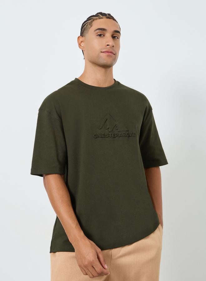 Styli Men Olive Graphic Embossed Oversized T-Shirt - Image 3