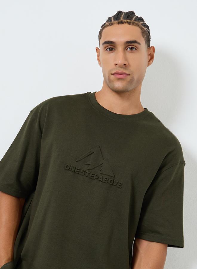 Styli Men Olive Graphic Embossed Oversized T-Shirt - Image 1