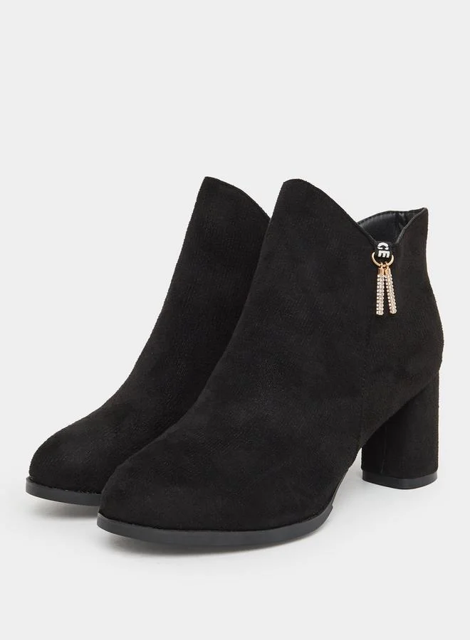 تايك تو حذاء بوت من الشمواه بكعب عريض