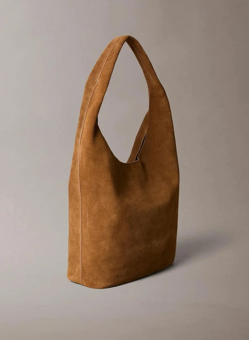 Calvin Klein Argan Oil Slouchy Suede Leather Medium Shoulder Bag for Women | Best Price UAE