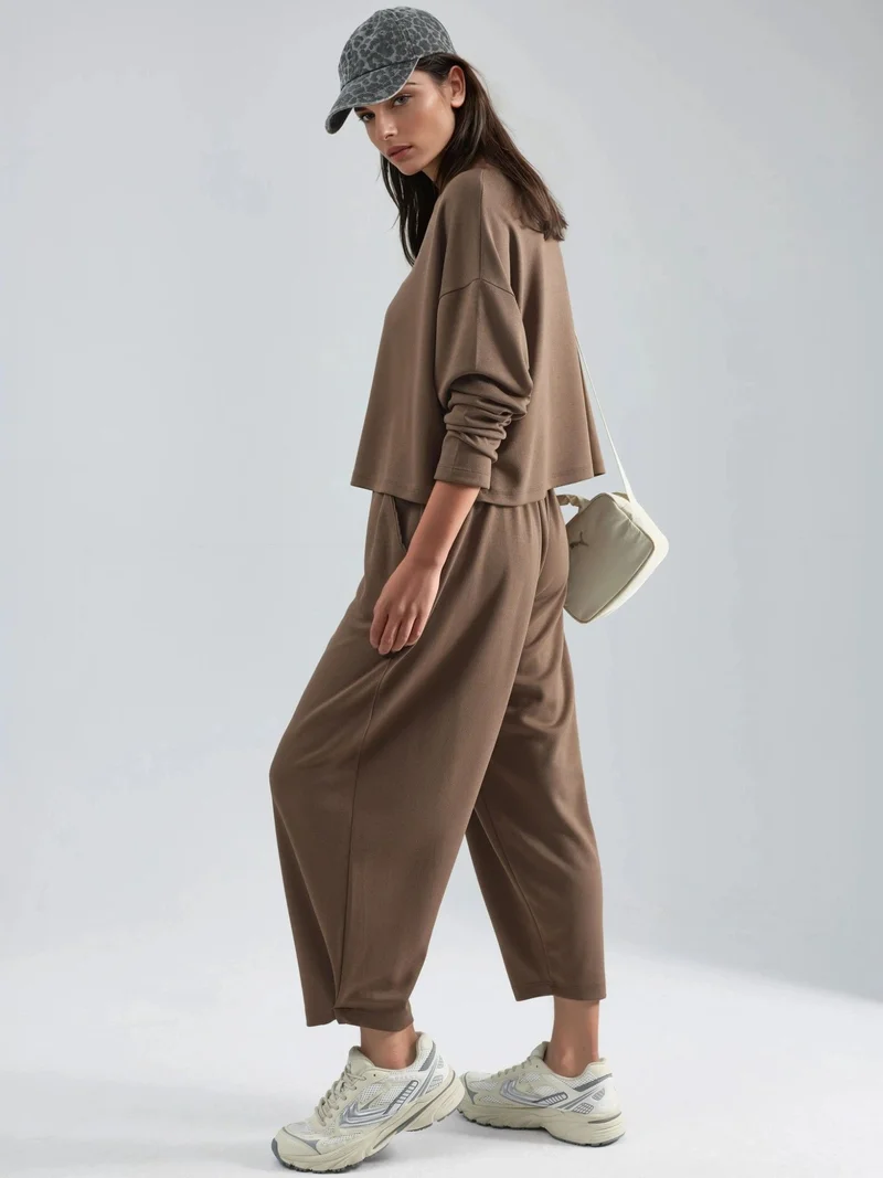 زوبعة طقم بلوزة وبنطلون سالوار من مودال تاتش مجموعة بيرسان