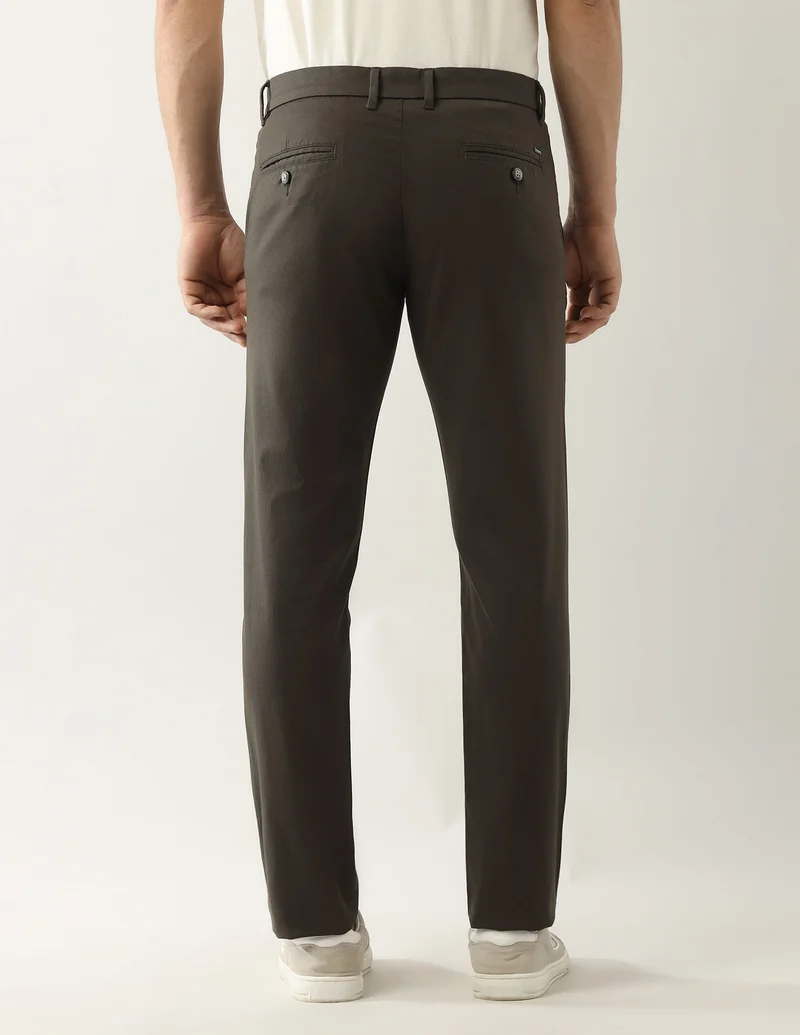 Arrow Dark Brown Solid Autopress Flx Trousers for Men | Best Price UAE