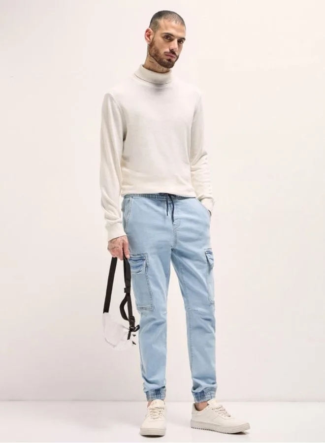 The Bear House  Men's Light Blue Slim Fit Jogger-Style jean with Cargo Pockets Classic Comfort With Modern Style, Perfect For Everyday Casual Looks And Effortless Streetwear Vibes for Men | Best Price UAE