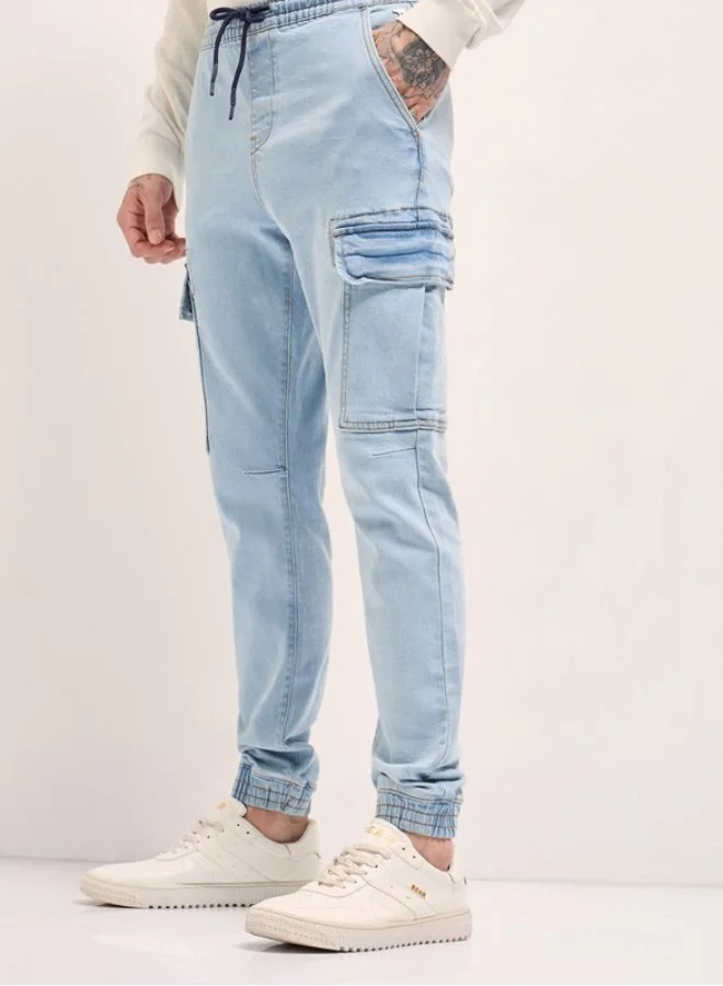 The Bear House  Men's Light Blue Slim Fit Jogger-Style jean with Cargo Pockets Classic Comfort With Modern Style, Perfect For Everyday Casual Looks And Effortless Streetwear Vibes for Men | Best Price UAE