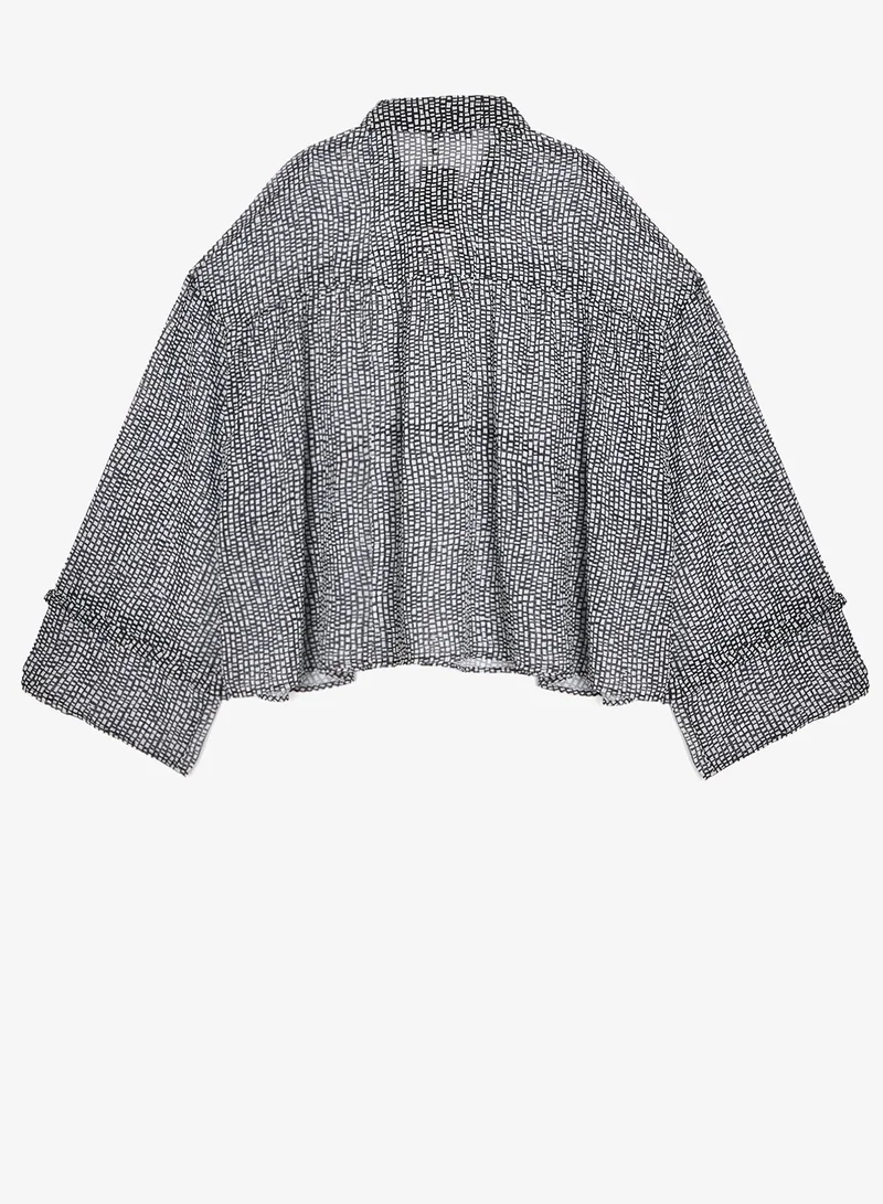 جينجر بلس بلوزة بأزرار وطبعة أحادية اللون