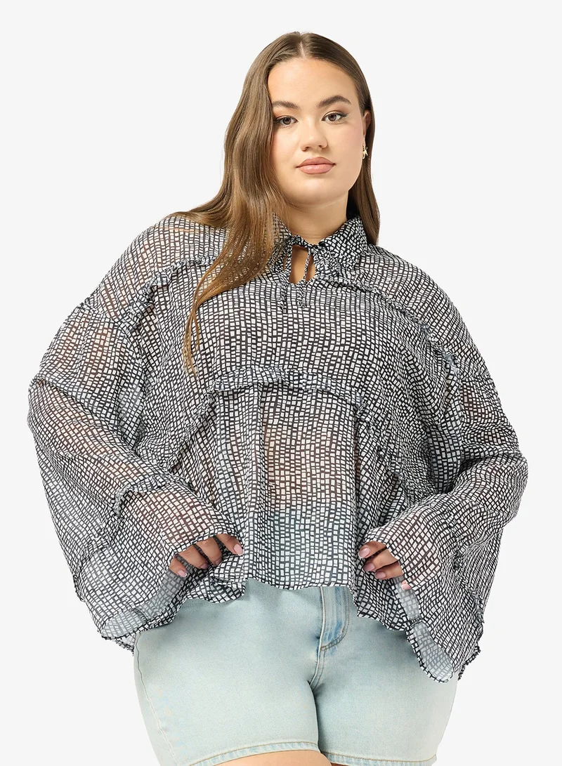 جينجر بلس بلوزة بأزرار وطبعة أحادية اللون