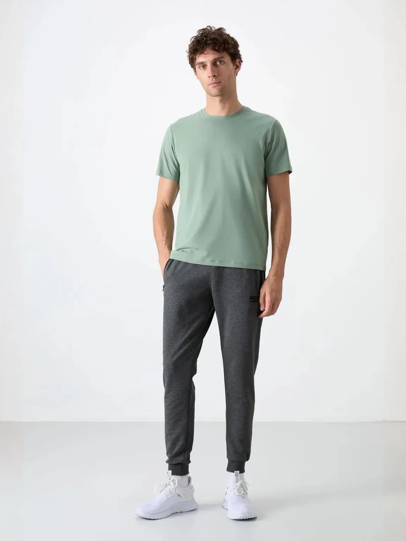 تومي لايف TOMMY Men's Solid Jogger Sweatpants